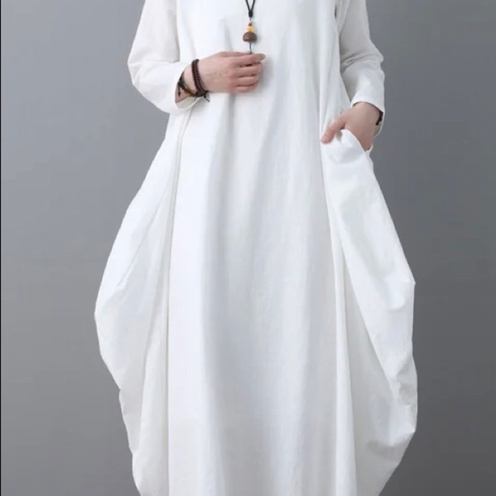 Butkus white linen maxi dress. Fully lined.